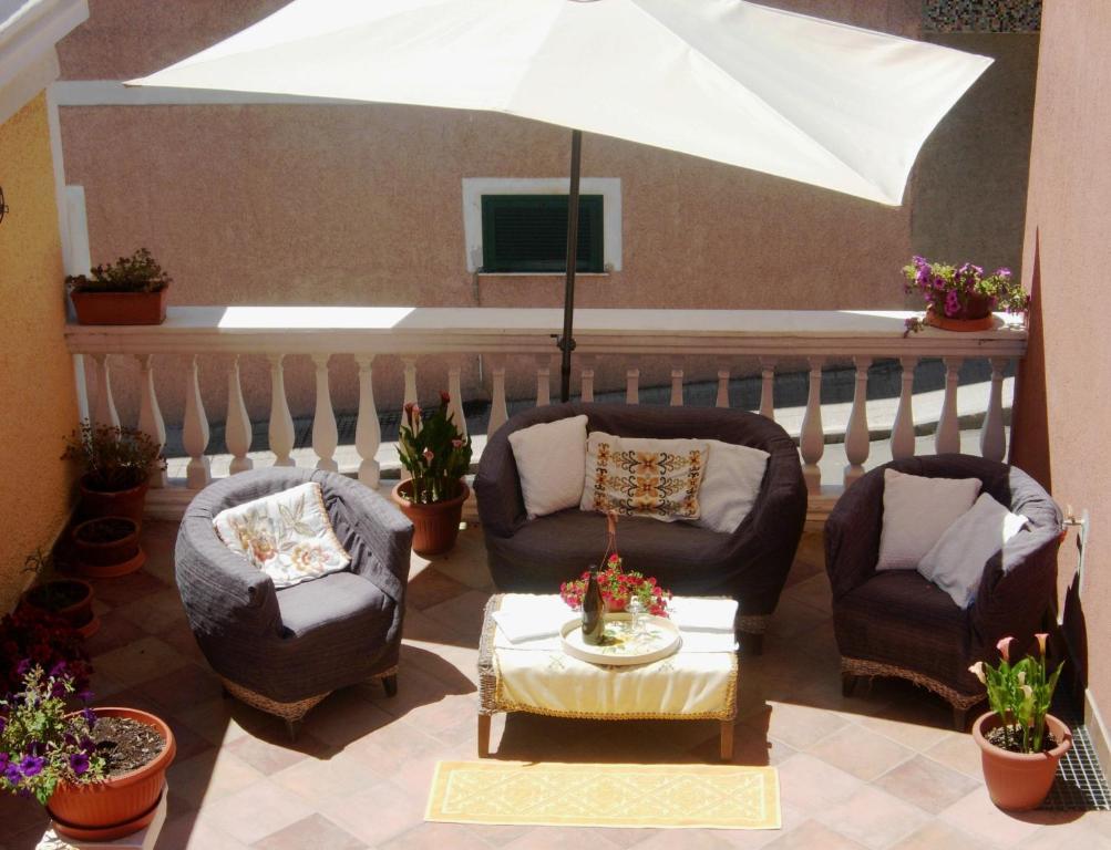 B&B Guest House Il Porto Vecchio Stintino Bagian luar foto