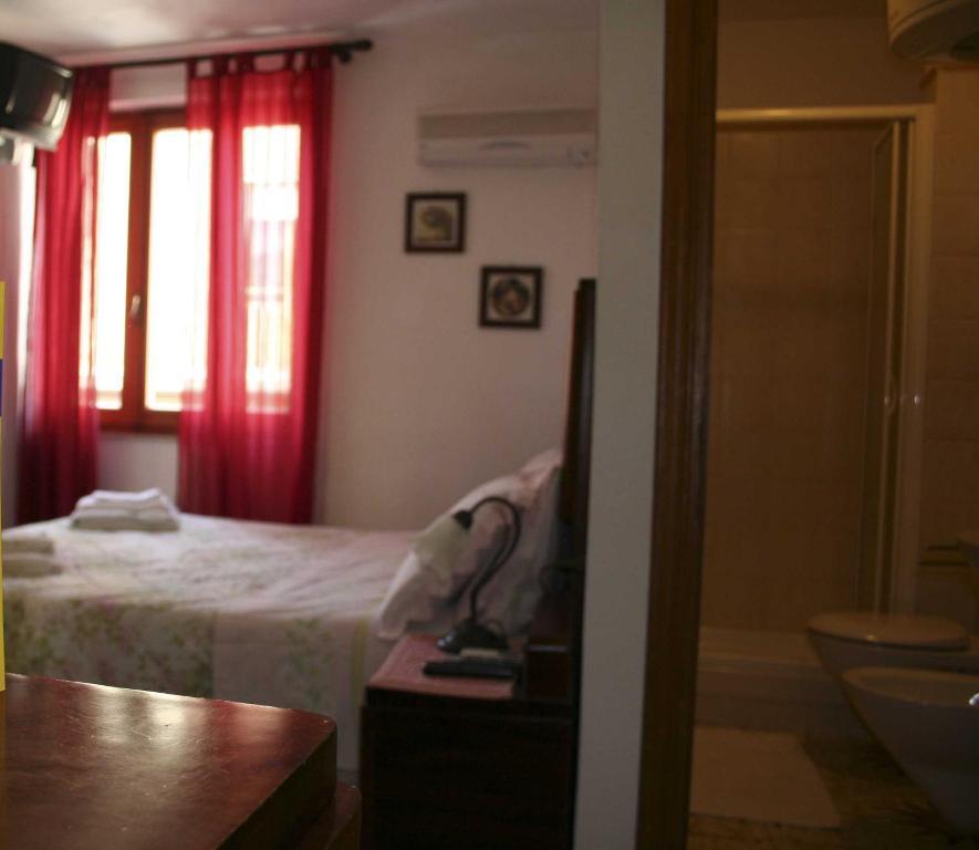 B&B Guest House Il Porto Vecchio Stintino Ruang foto
