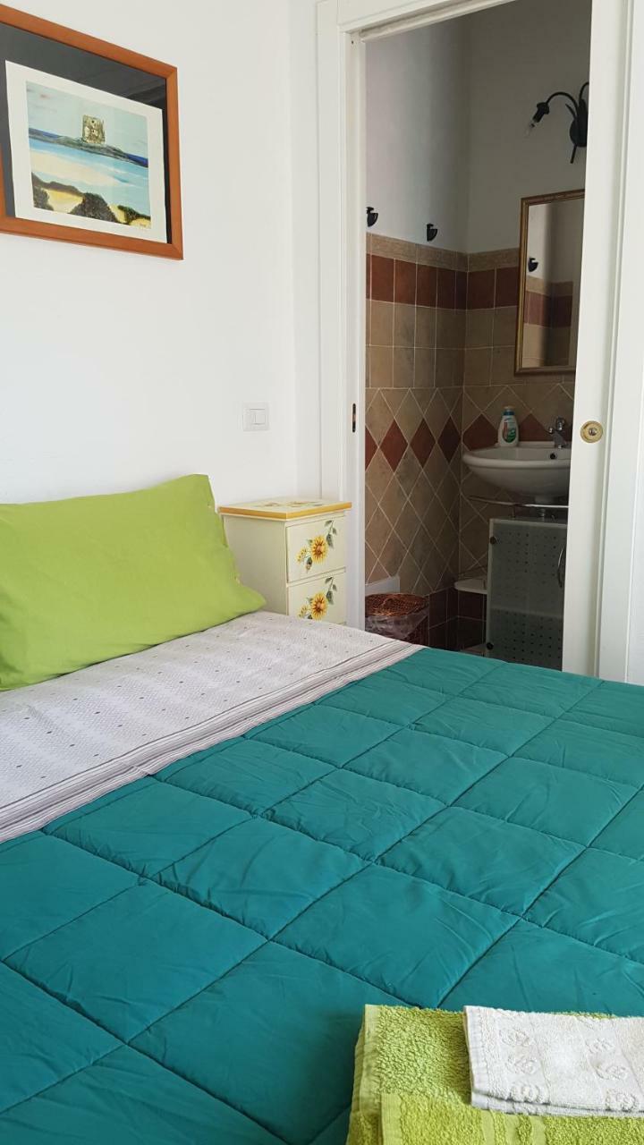 B&B Guest House Il Porto Vecchio Stintino Bagian luar foto